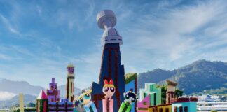 ▲主花毯為歷屆最大，高18米、直徑60米，其中，以魔人啾啾的基地為裝置的最高點。（記者廖家賢翻攝）