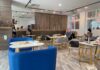 新光水資源回收中心的「黑水號」咖啡廳展現文青又時尚元素，室內空間以「貓」為主題意象。（圖/記者林均和攝）