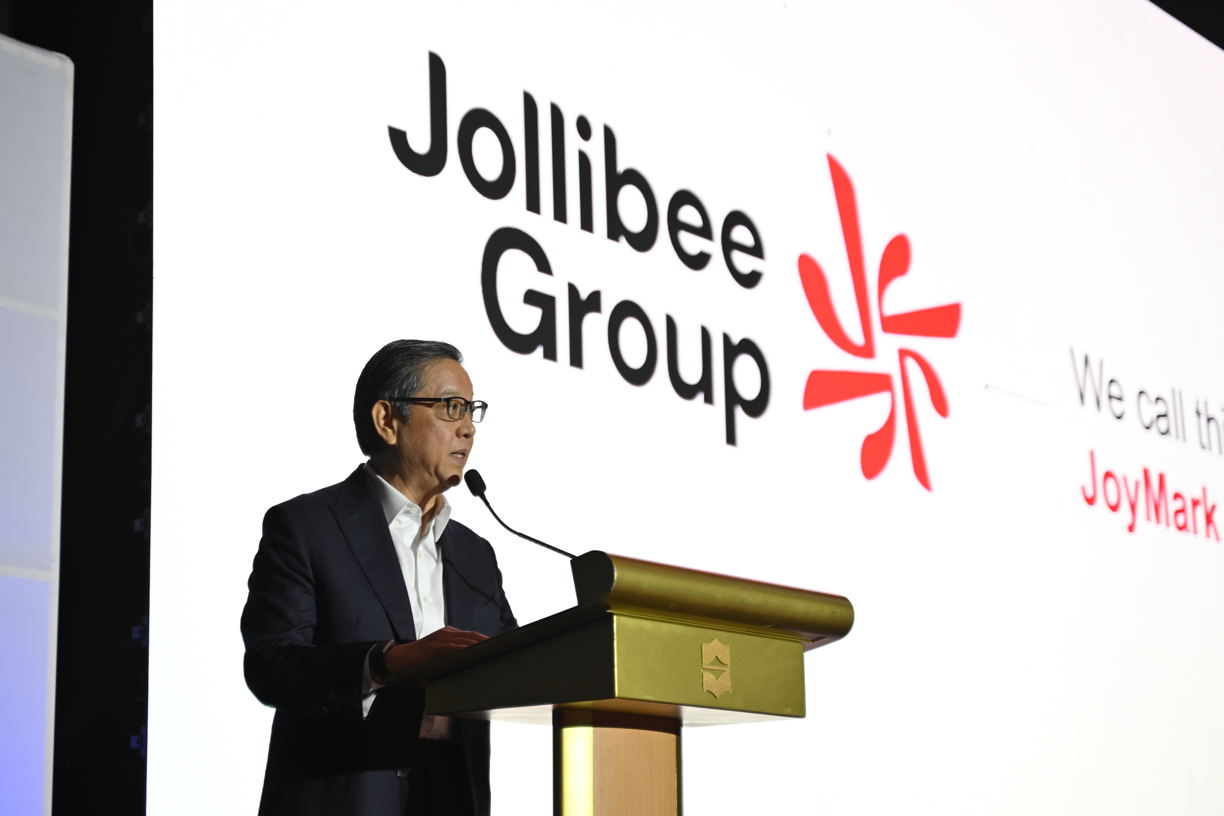JoyMark 標誌:Tanmantiong表示,全新企業標誌中的「JoyMark」圖像象徵集團活力、進取動力與團結精神。圖案特意傾斜 8 度,以向 Jolibee 集團於 1978 年創立的歷史致敬。