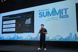 A person standing on a stage AI-generated content may be incorrect.